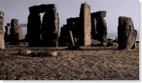 Stones in shadows - greyscale with added sepia overtone and blue overtone on sky.